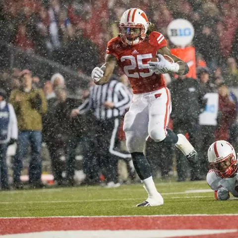 Wisconsin Badgers running back Melvin Gordon (25) scores on a 26-yard run to set the NCAA single-game rushing record with 408 yards during an NCAA football game against the Nebraska Cornhuskers Saturday, November 15, 2014, in Madison, Wis. (Photo by David Stluka)