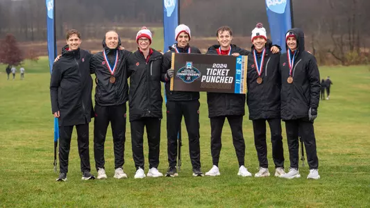 UW men's cross country celebrates its runner-up finish at the NCAA Great Lakes Regional