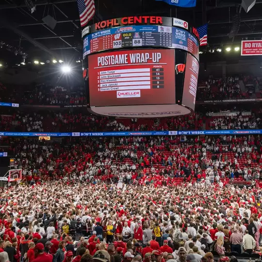 The Student Section storms the court after beating No. 9 Arizona