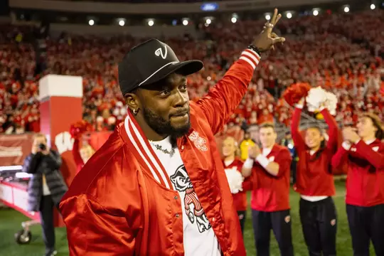 Melvin Gordon waves to the crowd on the 10-year anniversary of his 408-yard game against Nebraska.