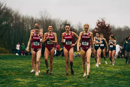 The Wisconsin women's cross country team recovers together after racing at the NCAA Great Lakes Regional in Norton, Ohio.