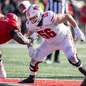 Wisconsin Badgers offensive lineman Joe Brunner (56) blocks during a Big Ten Conference NCAA college football game against the Rutgers Scarlet Knights, Saturday, Oct. 12, 2024, in Piscataway, NJ. The Badgers won 42-7. (Photo by David Stluka/Wisconsin Athletic Communications)