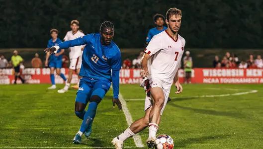 Kevin Andrews dribbles against UCLA