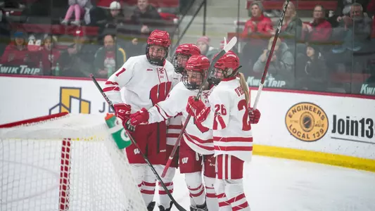 Simms celebrates a goal with the Badgers against St. Thomas