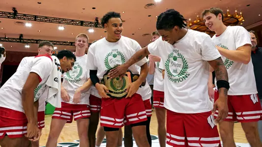 John Tonje celebrates with the Greenbrier Tip-Off MVP belt