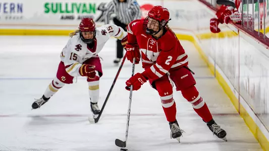 Finley McCarthy skates with the puck against Boston College
