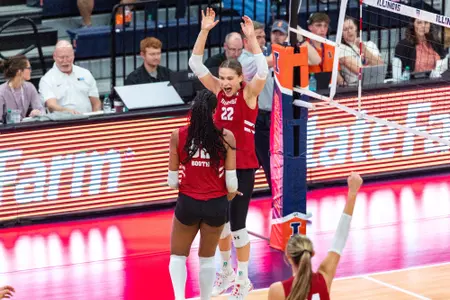 Julia Orzol celebrates with Carter Booth against Illinois