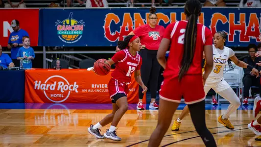 Ronnie Porter takes ball down the court