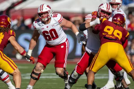 Wisconsin Badgers offensive lineman Joe Huber (60) blocks during a Big Ten Conference NCAA college football game against the USC Trojans, Saturday, Sept. 28, 2024, in Los Angeles, Cal. USC won 38-21. (Photo by David Stluka/Wisconsin Athletic Communications)
