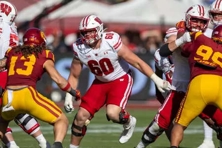 Wisconsin Badgers offensive lineman Joe Huber (60) blocks during a Big Ten Conference NCAA college football game against the USC Trojans, Saturday, Sept. 28, 2024, in Los Angeles, Cal. USC won 38-21. (Photo by David Stluka/Wisconsin Athletic Communications)