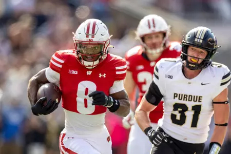 Wisconsin Badgers wide Receiver Vinny Anthony II (8) scores a touchdown during a Big Ten Conference NCAA college football game against the Purdue Boilermakers, Saturday, Oct. 5, 2024, in Madison, Wis. The Badgers won 52-6. (Photo by David Stluka/Wisconsin Athletic Communications)
