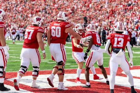 Wisconsin Badgers wide Receiver Vinny Anthony II (8) celebrates a touchdown with teammates during a Big Ten Conference NCAA college football game against the Purdue Boilermakers, Saturday, Oct. 5, 2024, in Madison, Wis. The Badgers won 52-6. (Photo by David Stluka/Wisconsin Athletic Communications)