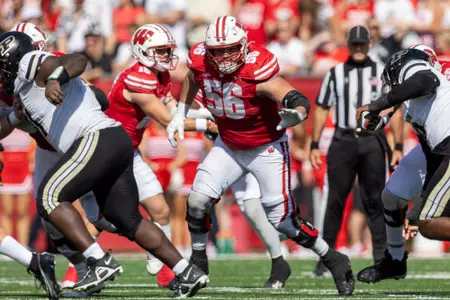 Wisconsin Badgers offensive lineman Joe Brunner (56) blocks during a Big Ten Conference NCAA college football game against the Purdue Boilermakers, Saturday, Oct. 5, 2024, in Madison, Wis. The Badgers won 52-6. (Photo by David Stluka/Wisconsin Athletic Communications)