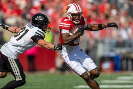 Wisconsin Badgers wide receiver Vinny Anthony II (8) carries the ball during a Big Ten Conference NCAA college football game against the Purdue Boilermakers, Saturday, Oct. 5, 2024, in Madison, Wis. The Badgers won 52-6. (Photo by David Stluka/Wisconsin Athletic Communications)
