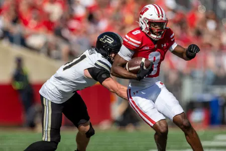 Wisconsin Badgers wide receiver Vinny Anthony II (8) carries the ball during a Big Ten Conference NCAA college football game against the Purdue Boilermakers, Saturday, Oct. 5, 2024, in Madison, Wis. The Badgers won 52-6. (Photo by David Stluka/Wisconsin Athletic Communications)