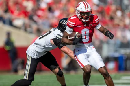 Wisconsin Badgers wide receiver Vinny Anthony II (8) carries the ball during a Big Ten Conference NCAA college football game against the Purdue Boilermakers, Saturday, Oct. 5, 2024, in Madison, Wis. The Badgers won 52-6. (Photo by David Stluka/Wisconsin Athletic Communications)