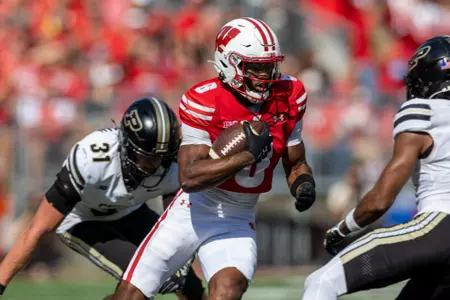Wisconsin Badgers wide receiver Vinny Anthony II (8) carries the ball during a Big Ten Conference NCAA college football game against the Purdue Boilermakers, Saturday, Oct. 5, 2024, in Madison, Wis. The Badgers won 52-6. (Photo by David Stluka/Wisconsin Athletic Communications)