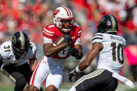Wisconsin Badgers wide receiver Vinny Anthony II (8) carries the ball during a Big Ten Conference NCAA college football game against the Purdue Boilermakers, Saturday, Oct. 5, 2024, in Madison, Wis. The Badgers won 52-6. (Photo by David Stluka/Wisconsin Athletic Communications)