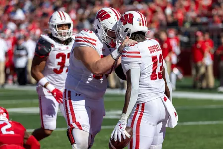 Wisconsin Badgers running back Darrion Dupree (13) celebrates his first career touchdown during a Big Ten Conference NCAA college football game against the Rutgers Scarlet Knights, Saturday, Oct. 12, 2024, in Piscataway, NJ. The Badgers won 42-7. (Photo by David Stluka/Wisconsin Athletic Communications)