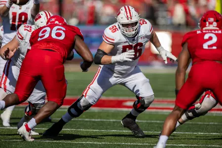 Wisconsin Badgers offensive lineman Joe Brunner (56) blocks during a Big Ten Conference NCAA college football game against the Rutgers Scarlet Knights, Saturday, Oct. 12, 2024, in Piscataway, NJ. The Badgers won 42-7. (Photo by David Stluka/Wisconsin Athletic Communications)