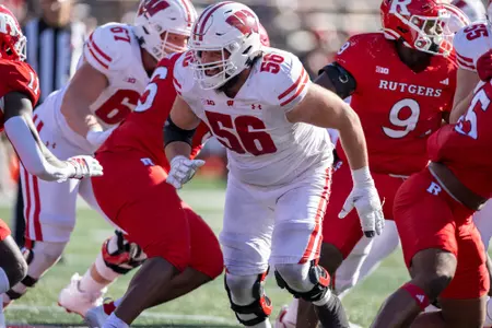 Wisconsin Badgers offensive lineman Joe Brunner (56) blocks during a Big Ten Conference NCAA college football game against the Rutgers Scarlet Knights, Saturday, Oct. 12, 2024, in Piscataway, NJ. The Badgers won 42-7. (Photo by David Stluka/Wisconsin Athletic Communications)