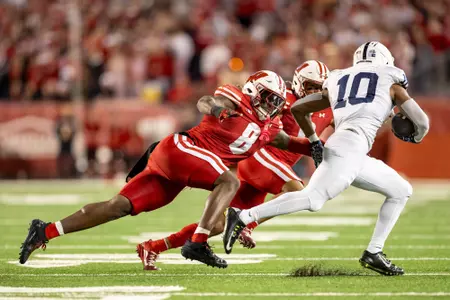 Wisconsin Badgers linebacker Leon Lowery Jr. (8) makes a tackle during a Big Ten Conference NCAA college football game against the Penn State Nittany Lions, Saturday, Oct. 26, 2024, in Madison, Wis. The Nittany Lions won 28-13. (Photo by David Stluka/Wisconsin Athletic Communications)