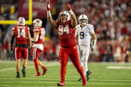 Wisconsin Badgers defensive lineman Elijah Hills (94) celebrates a tackle during a Big Ten Conference NCAA college football game against the Penn State Nittany Lions, Saturday, Oct. 26, 2024, in Madison, Wis. The Nittany Lions won 28-13. (Photo by David Stluka/Wisconsin Athletic Communications)