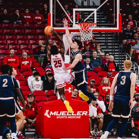 John Blackwell shoots near the rim against Montana State