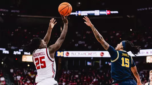 John Blackwell rises up for a shot against Michigan