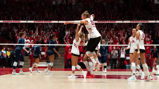 Badgers celebrate after a point against Georgia Tech in Round 2 of the NCAA Tournament