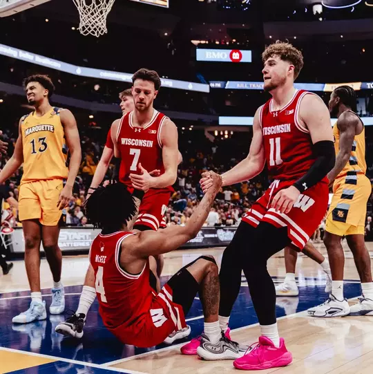 Badgers help up Kamari McGee against Marquette