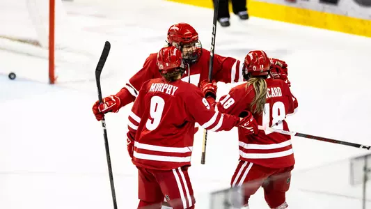 Badgers celebrate a goal in their 7-0 win at Bemidji State