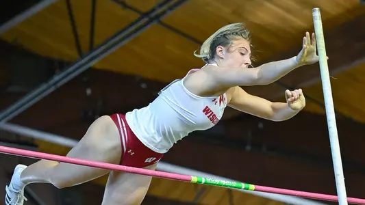 Kenzi Kluge clears the pole vault at the Larry Wieczorek Invitaitonal