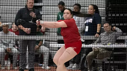 Asia Rave competes in the weight throw at the Badgers Windy City Invitational on Feb. 9 2024