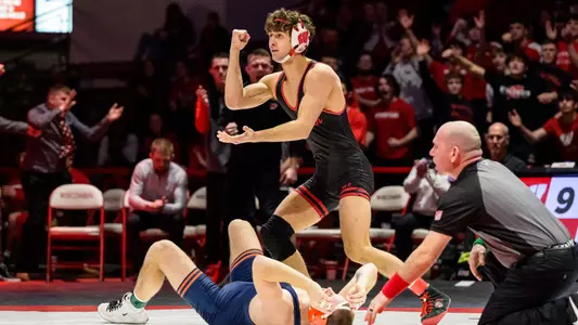 Dean Hamiti celebrates a pin during Wisconsin wrestling's dual match vs. Illinois on Sunday, Feb. 11, 2024 at the UW Field House in Madison, Wisconsin.