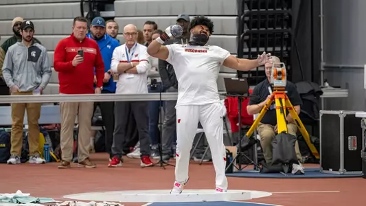 Andrew Stone competes in the shot put at the Badger Windy City Invitational on Feb. 10