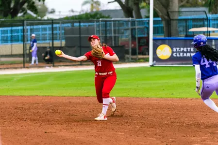 Ellie Hubbard throws the ball from shortstop against Washington
