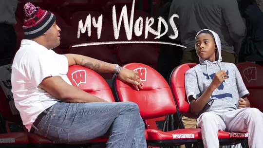 Rashard Griffith talks with Jerell Moore, son of Howard Moore at Wisconsin men's basketball practice