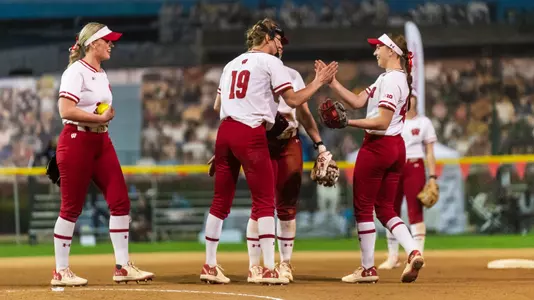 Softball team celebrate Shelby Jacobson out