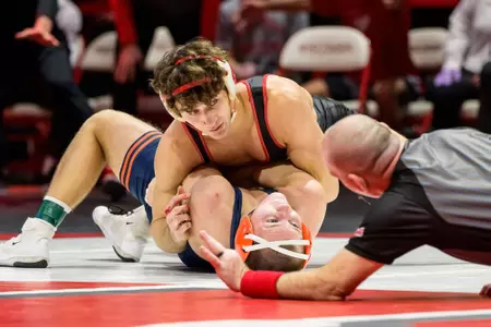 Dean Hamiti defeats his Illinois opponent during a Wisconsin Wrestling dual match against the Illini on Sunday, Feb. 11, 2024 at the UW Field House in Madison, Wisconsin.