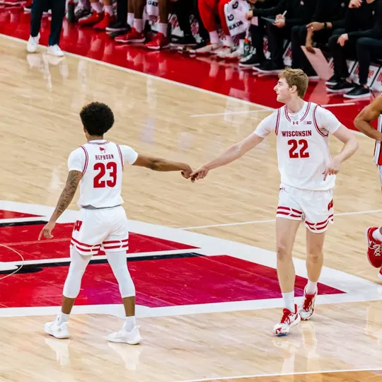 Chucky Hepburn (23) and Steven Crowl (22) against Ohio State