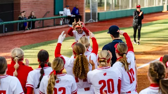 Brooke Kuffel celebrates home run with team