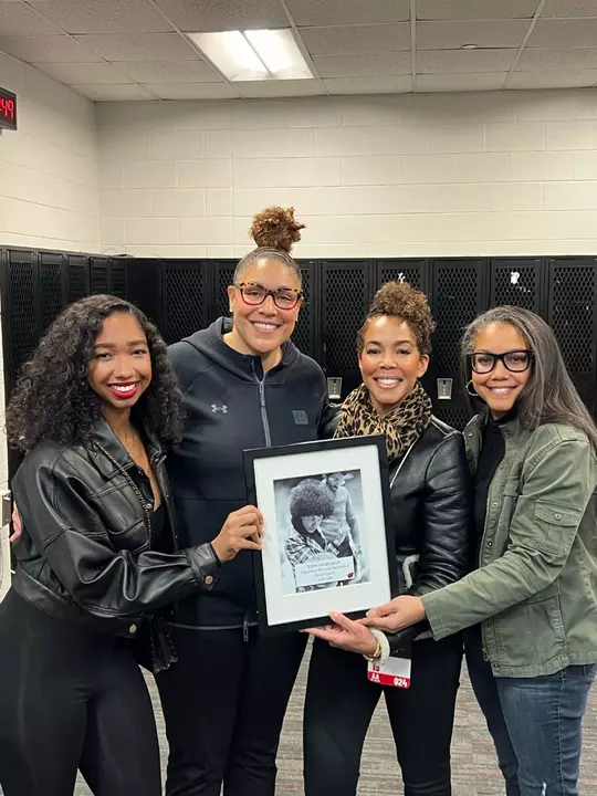 Marisa Moseley with Qualls' Family