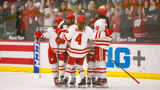 Wisconsin women's hockey celebrates a goal against St. Thomas in the first round of the WCHA playoffs on March 1, 2024