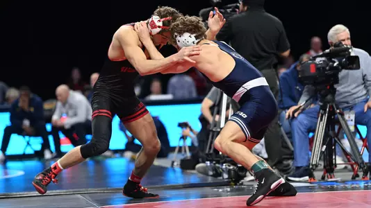 Wisconsin wrestler Dean Hamiti battles Penn State's Mitchell Mesebrink in the 165-pound final of the 2024 Big Ten Championships. Mesenbrink narrowly won the bout 13-11 in the closing minute to win the title at the XFINITY Center at the University of Maryland in College Park, Md.