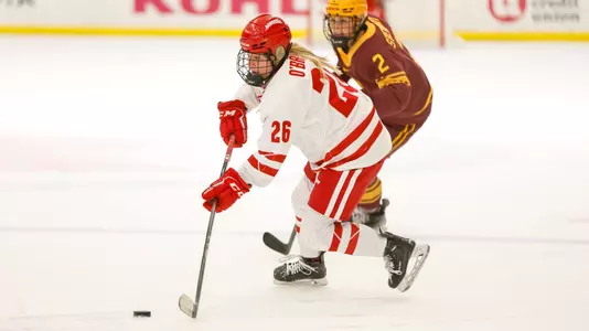 Casey O'Brien handles a puck against Minnesota