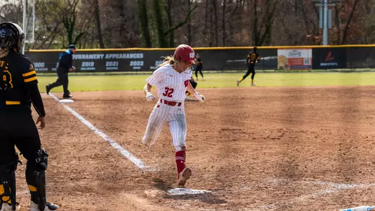 Marytherese Nevin crosses the plate against UMBC