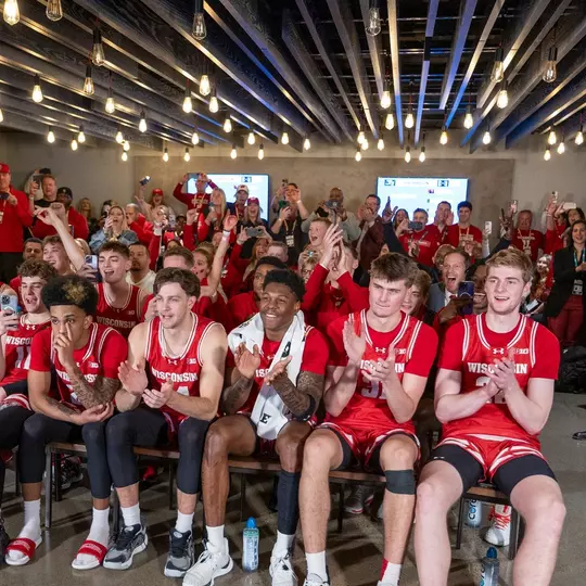 Wisconsin Badgers watch the NCAA Bracket Selection after the Big Ten Championship men’s basketball game against the Illinois Fighting Illini, Sunday., March 17, 2024, in Minneapolis, Min. (Photo by David Stluka/UW Athletic Communications)