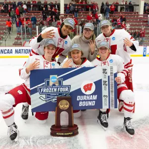 Wisconsin women's hockey sophomore celebrate a regional title