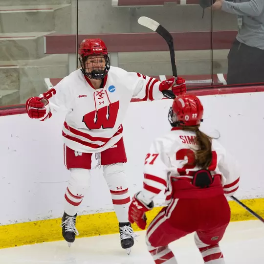 Casey O'Brien and Kirsten Simms celebrate a goal against St. Lawrence on March 16, 2024